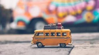 Selective Focus Photography of Yellow School Bus Die-cast